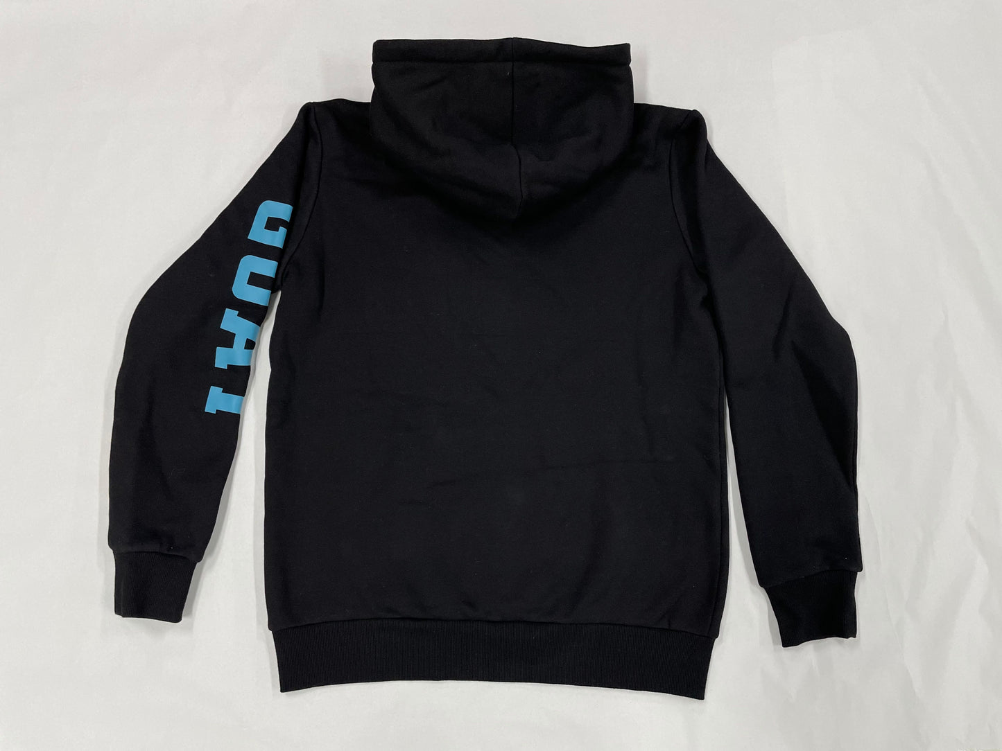 Black hoodie with blue text on sleeve against a white background