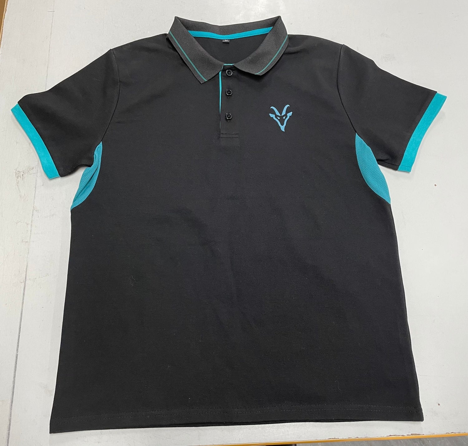 A premium Goat Workwear polo shirt
