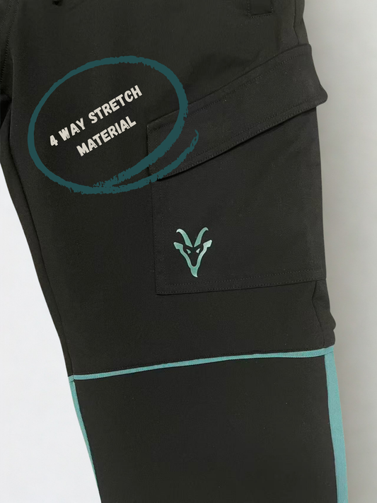 Black construction workwear trousers with teal accents and a brand logo on a light gray background